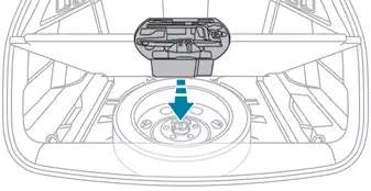 Peugeot 308. Putting the spare wheel back in place